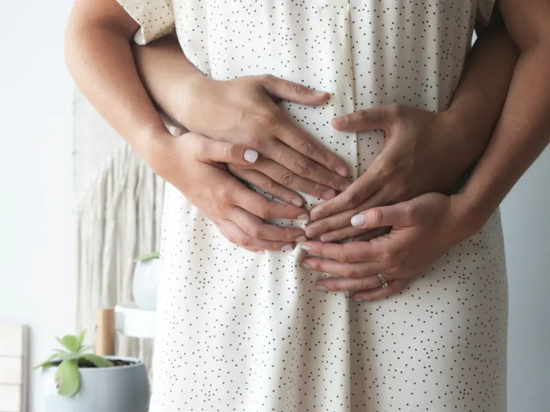 Pregnant couple.