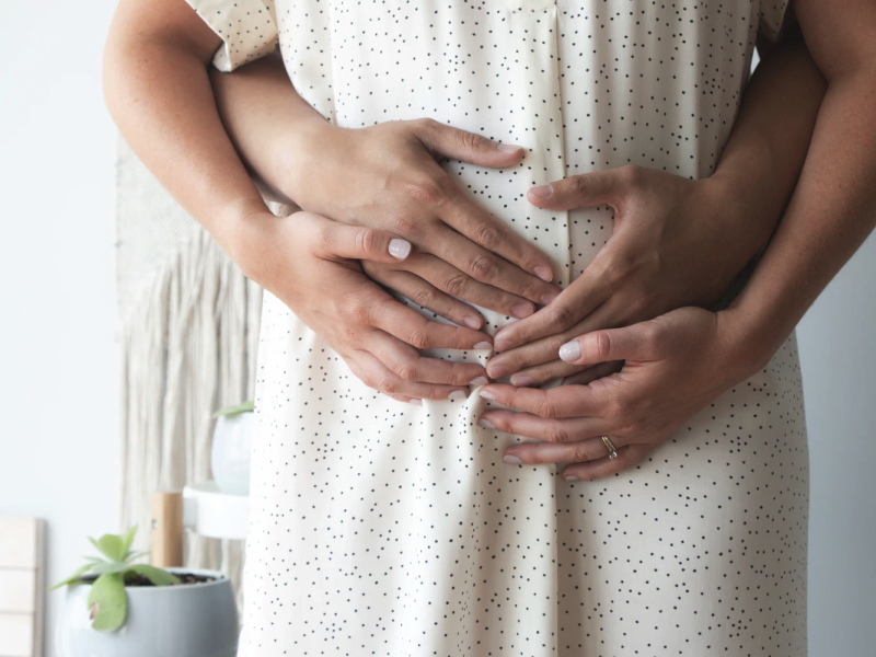 Pregnant couple.